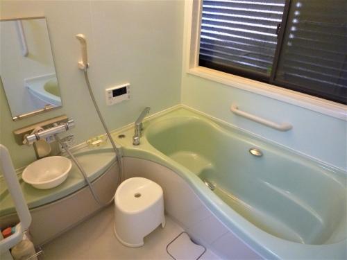 Koupelna v ubytování ゲストハウス あずも GuestHouse AZMO