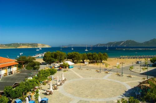 an aerial view of a park next to a body of water at Hotel Alex in Methoni