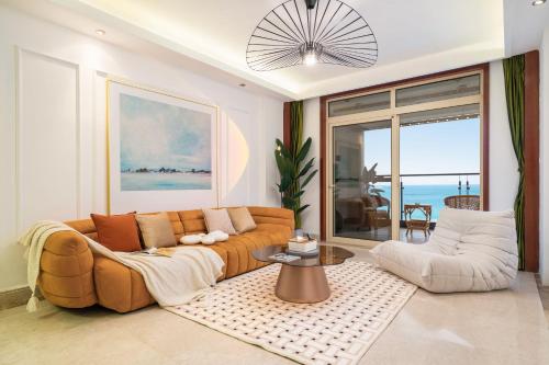 O zonă de relaxare la Sanya Yikehai View Apartments