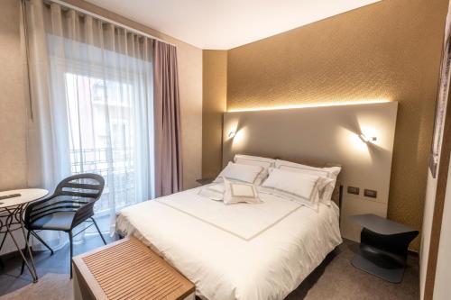 A bed or beds in a room at B&B il Divino