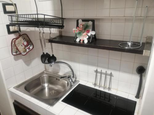 Kuchyňa alebo kuchynka v ubytovaní RomAmoR Campo de' fiori