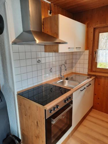 Kuchyň nebo kuchyňský kout v ubytování Gerda's Ferienhäuser
