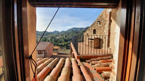 a view from a window of a building at espai Abadia La Trilla in Argentera