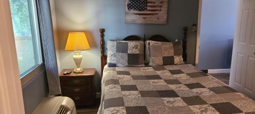 Ένα ή περισσότερα κρεβάτια σε δωμάτιο στο Gatlinburg Chateau Condo 301