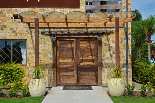 Muka bangunan atau pintu masuk La Ferrugem Suites - 100 mts da Praia