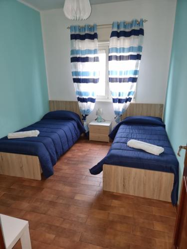 Krevet ili kreveti u jedinici u objektu Palermo Tusa Apartment