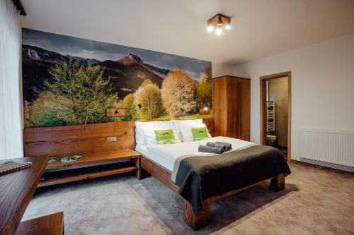 Posteľ alebo postele v izbe v ubytovaní Apartmány Planina Predná Hora