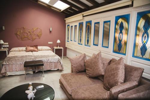 Postel nebo postele na pokoji v ubytování LA CASONA DE BAUTISTA 4 estrellas con piscina montanchez CACERES
