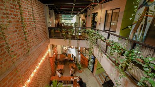 an overhead view of a building with plants at Rango Hostel Boutique in Medellín