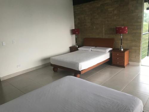 Una cama o camas en una habitación de El Espume de San Juan by JR