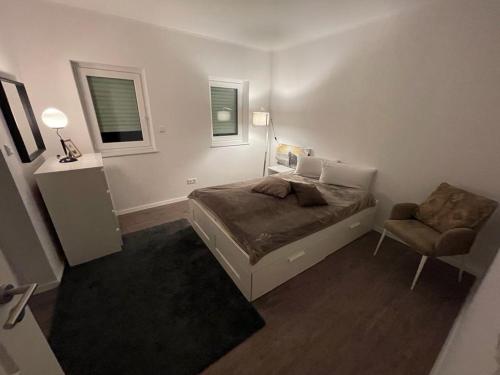 Cama ou camas em um quarto em Lux Apartmant 2 Westerstede