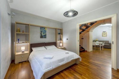 Ένα ή περισσότερα κρεβάτια σε δωμάτιο στο Casa Amore