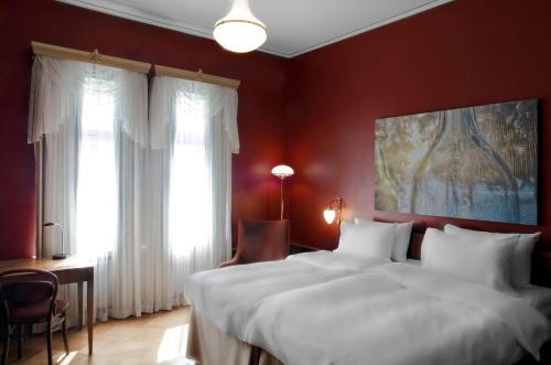 Postel nebo postele na pokoji v ubytování Radisson Blu Aleksanteri Hotel, Helsinki