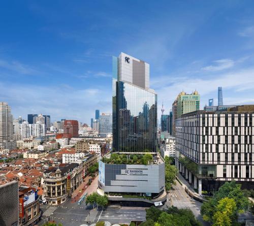 a view of a city with tall buildings at Radisson Collection Hyland Shanghai in Shanghai