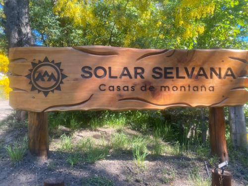 a sign for the solar settlementcascas de montana at Solar Selvana - Casas de montaña in Villa La Angostura
