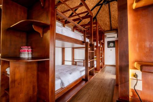 a bedroom with two bunk beds in a room at Good Time Relax Resort in Kampot