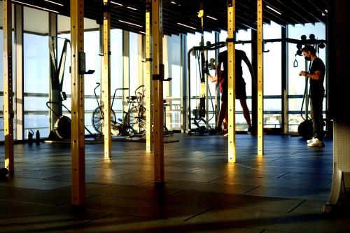a group of people in a gym with bikes at The Icon Limassol in Limassol
