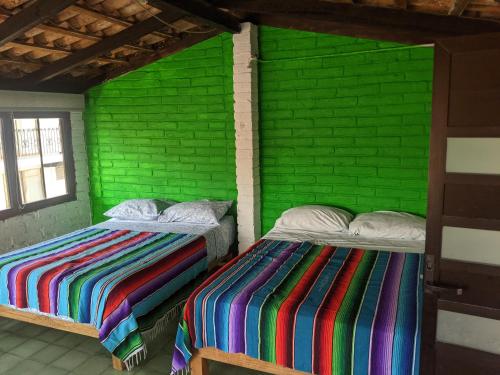 Cama o camas de una habitación en Casa Frida Vallarta