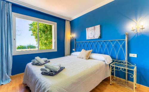 Llit o llits en una habitació de Apartamento Lázaro 26 Terraza con Vistas al Mar