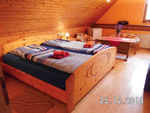 Postel nebo postele na pokoji v ubytování Gästehaus Auhagen