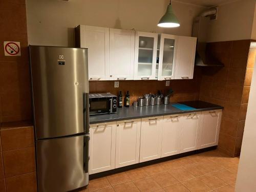 Kjøkken eller kjøkkenkrok på 50 People Bis Apartment