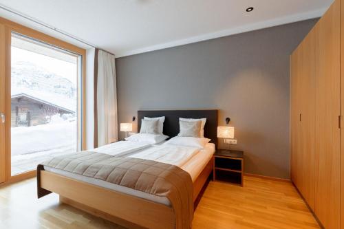 Posteľ alebo postele v izbe v ubytovaní Schneeglöckle Appartements