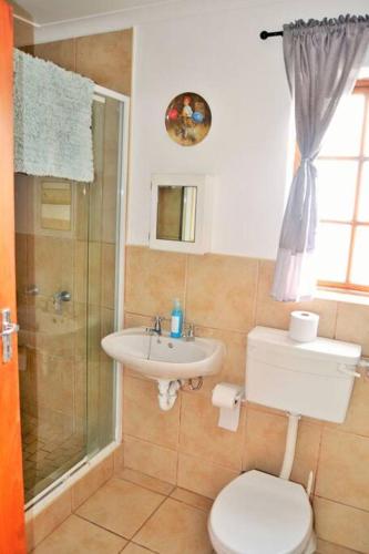 Ένα μπάνιο στο Agulhas Heights self-catering cottages BEST OCEAN VIEWS