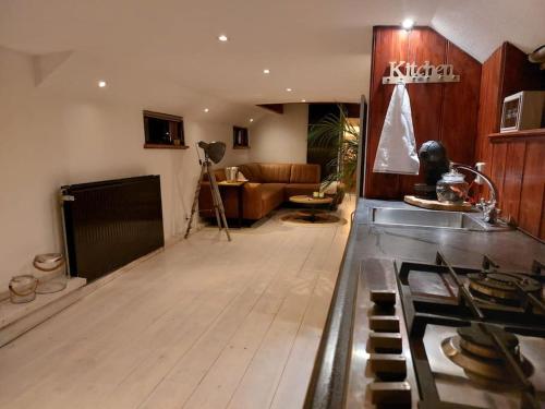 Kuchyň nebo kuchyňský kout v ubytování Het Waterhotel