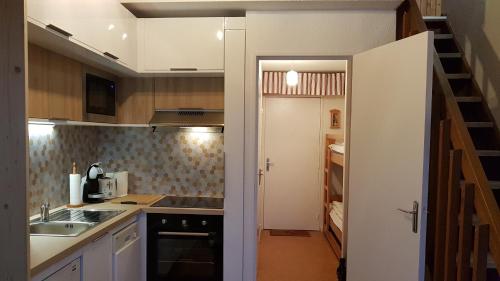 ครัวหรือมุมครัวของ Le Duplex Septimontain