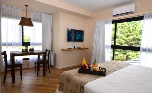 Ένα ή περισσότερα κρεβάτια σε δωμάτιο στο Ventania Golf Resort