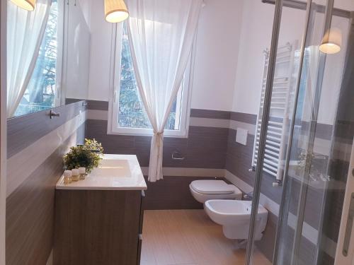 Koupelna v ubytování Michelangelo Apartments con parcheggio gratuito in loco e self check in