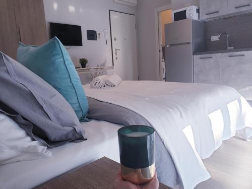 Michelangelo Apartments con parcheggio gratuito in loco e self check inにあるベッド