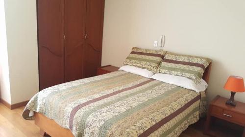 Postel nebo postele na pokoji v ubytování Hotel Castillo Real