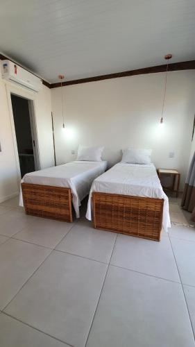 Katil atau katil-katil dalam bilik di Rosagash Paradise - Praia de Santo Antonio
