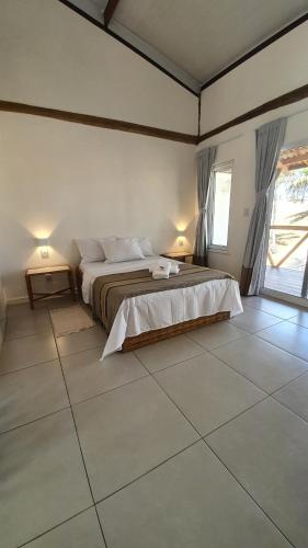 Rosagash Paradise - Praia de Santo Antonio tesisinde bir odada yatak veya yataklar