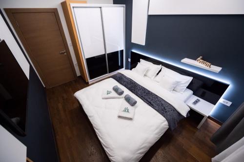 Ein Bett oder Betten in einem Zimmer der Unterkunft Apartman Zorić Zlatibor