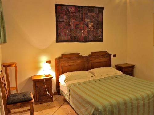 Postel nebo postele na pokoji v ubytování Agriturismo Il Magicorto