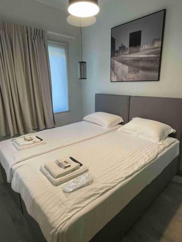 Katil atau katil-katil dalam bilik di WUKELA APARTMENTS