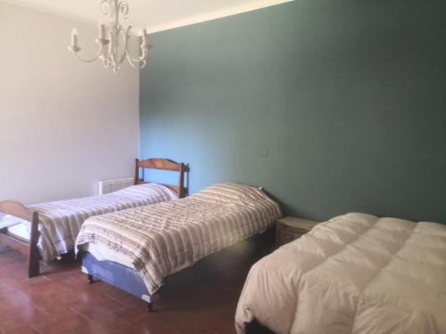 Ένα ή περισσότερα κρεβάτια σε δωμάτιο στο El Descanso