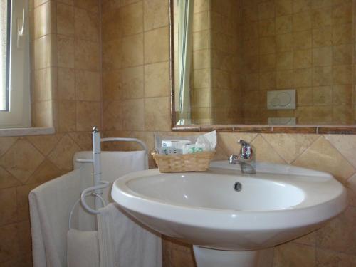 Koupelna v ubytování Hotel Maggiore
