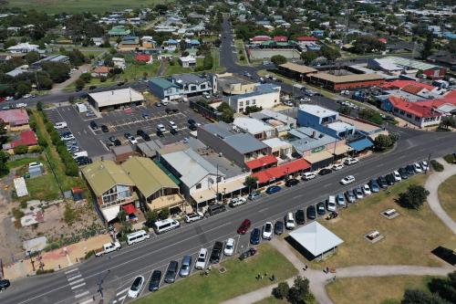 an aerial view of a small town with a street at Blue Ocean Motel Apollo Bay in Apollo Bay