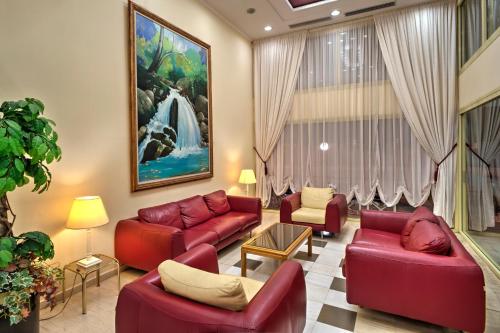 Гостиная зона в Angelika Pallas Hotel