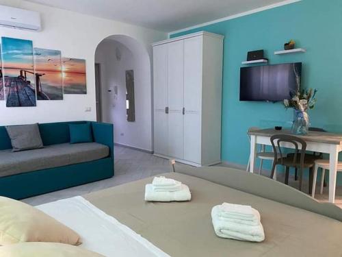 TV a/nebo společenská místnost v ubytování B&B La Lingua