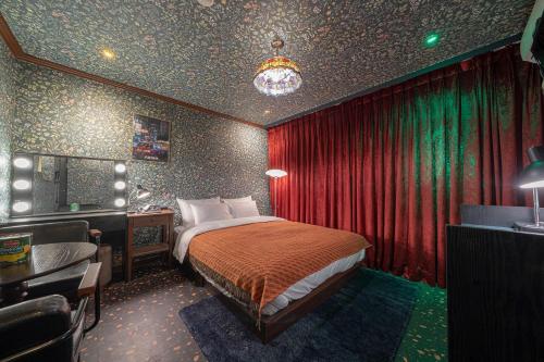 Postel nebo postele na pokoji v ubytování Shourin Hotel Cheonan by Aank