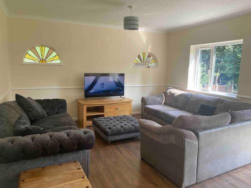 Gallery image of 3 bedroom bungalow set in private woodlands. in Upminster