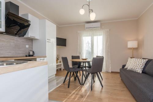 Kuchyňa alebo kuchynka v ubytovaní Apartments Star