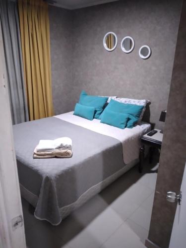 מיטה או מיטות בחדר ב-Apartment 209