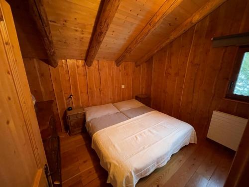מיטה או מיטות בחדר ב-CHALET ARMONIOSO