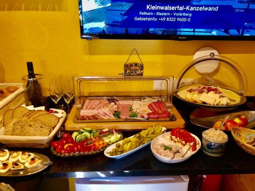 a buffet filled with lots of different types of food at Maier Pension in Bayerisch Eisenstein