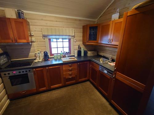 Dapur atau dapur kecil di 100m lift, 2 min swim - Large family cabin